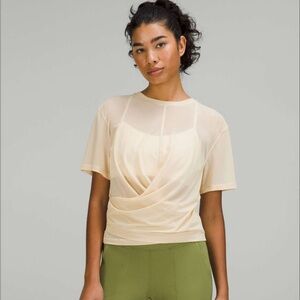 Lululemon Athletica Light Cream Short Sleeve Top